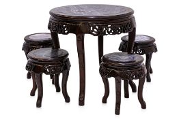 A MARBLE INSET CIRCULAR HARDWOOD TABLE AND FOUR STOOLS