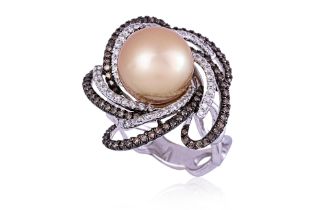 A CULTURED SOUTH SEA PEARL AND DIAMOND RING