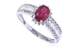 A RED STONE AND DIAMOND RING