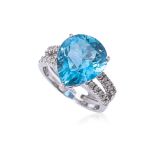 A BLUE TOPAZ AND DIAMOND RING