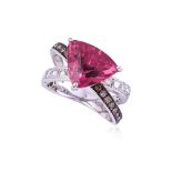 A PINK TOURMALINE AND DIAMOND CROSSOVER RING