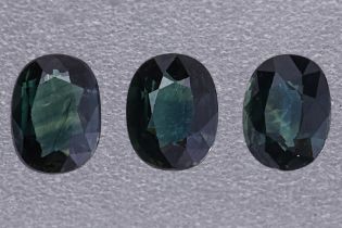 A GROUP OF GREEN SAPPHIRES