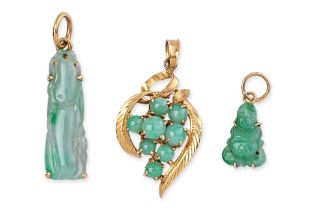 A GROUP OF GOLD MOUNTED JADEITE PENDANTS