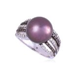 A CULTURED 'EDISON' FRESHWATER PEARL AND DIAMOND RING