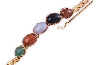 A MULTI COLOURED JADE AND GOLD BRACELET