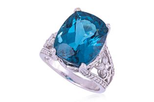 A LARGE BLUE TOPAZ AND DIAMOND RING