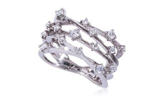 A DIAMOND 'CRISS CROSS' RING