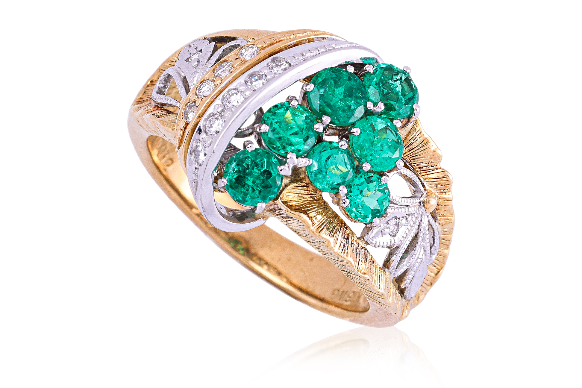 AN EMERALD AND DIAMOND RING