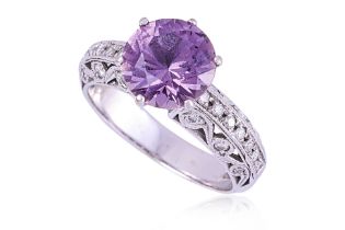 A PURPLE SPINEL AND DIAMOND RING