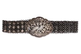 A SILVER THREE ROW BELT AND BUCKLE