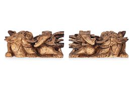 A PAIR OF GILT AND LACQUERED FOO LION MOUNTS