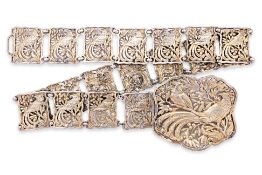 A PIERCED SILVER BIRD BELT AND BUCKLE