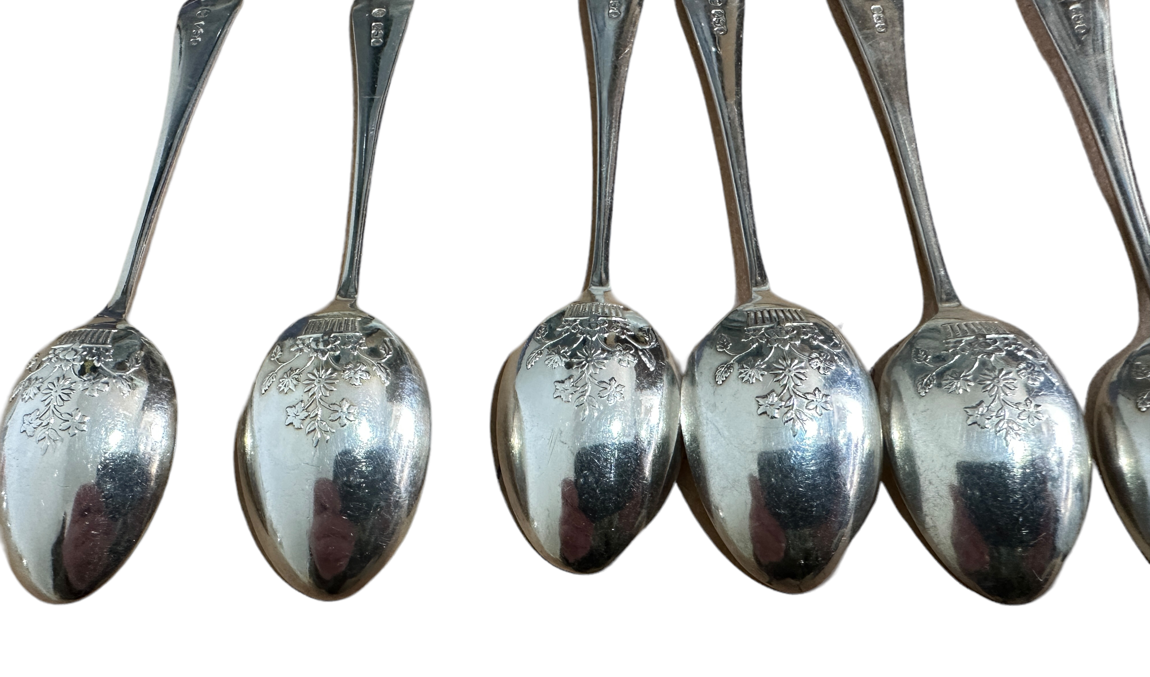 Lot of 11 Silver Spoons with decorated back of bowls - 12.5cm long. - Image 3 of 4