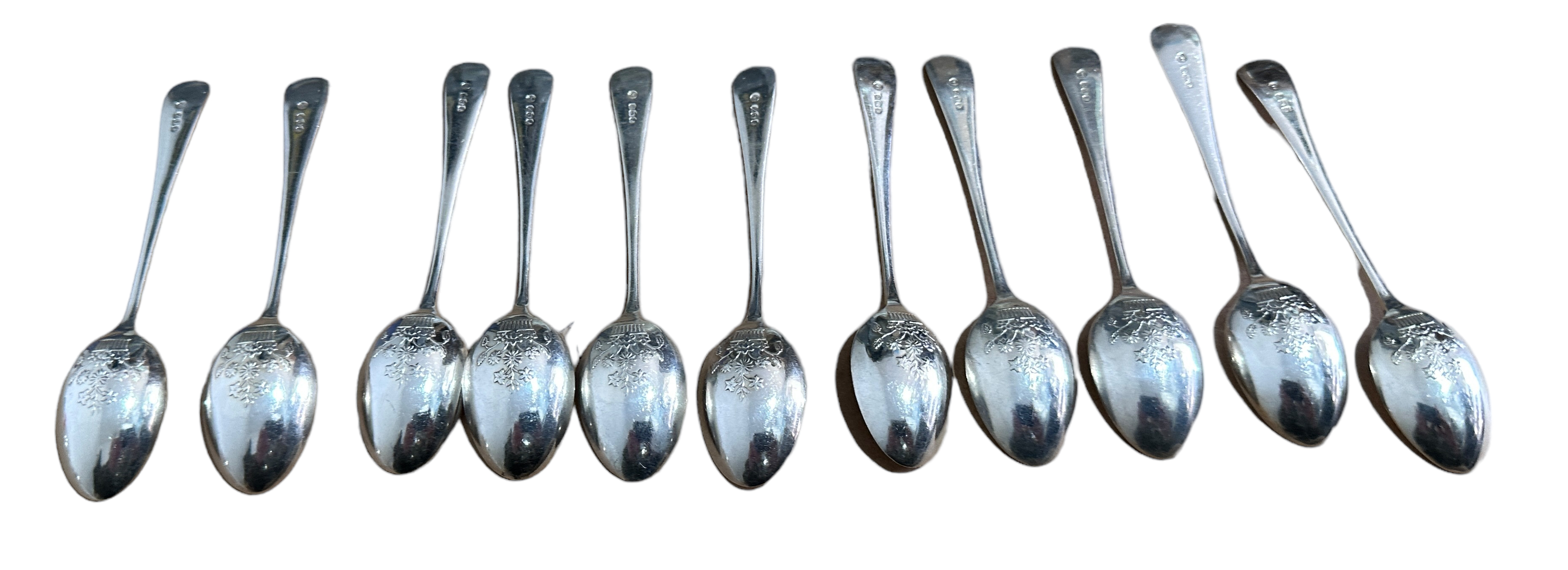 Lot of 11 Silver Spoons with decorated back of bowls - 12.5cm long. - Image 2 of 4