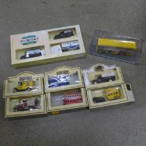 A box of Lledo and Matchbox die-cast model vehicles