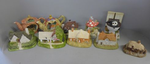 A collection of Lilliput Lane houses and other models and a boxed Border Fine Arts figure