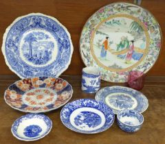 An oriental charger and plate, blue and white china and a cranberry glass custard cup **PLEASE