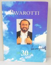 A Pavarotti autographed concert programme