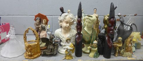 A collection of figures including carved African and Victorian style **PLEASE NOTE THIS LOT IS NOT