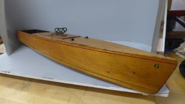 A wooden pond boat with clockwork mechanism, 83cm