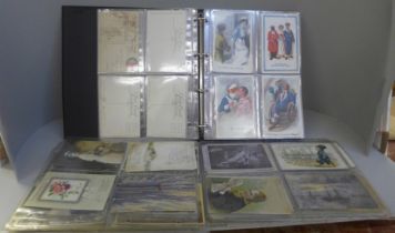 A collection of approximately 160 postcards, many affected by damp