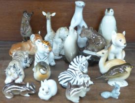 A collection of USSR Lomonosov ceramic models of animals; tiger, lion cubs, giraffes, zebra,