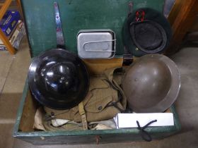 A regimental pine travelling box to D. Staniforth; two helmets, mess tin, uniform, belts, badges,