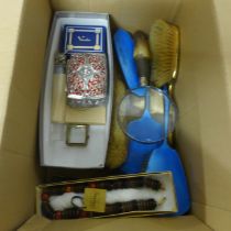 A small collection of jewellery, a blue enamel vanity set and a horn handle magnifying glass **