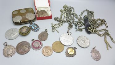 A collection of medallions, coins and Albert chains