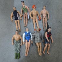 A collection of twenty-one Action Man figures and villains, clothes and accessories