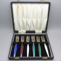 A cased set of six Danish silver and coloured enamel forks, enamel on one white fork a/f