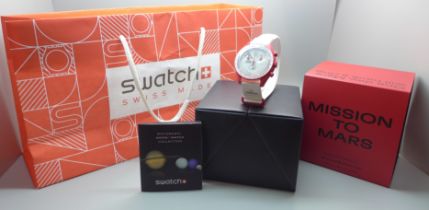 A Swatch Omega Bioceramic MoonSwatch Collection, Mission To Mars, (as new, unused, with receipt