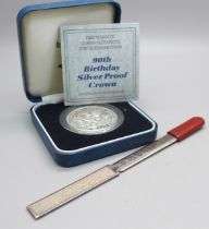 A Queen Elizabeth The Queen Mother silver proof crown and a silver letter opener, 24g