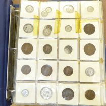 An album of coins, ten pages of GB, 1910 onwards and five pages of foreign coins and some