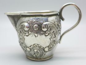 A German embossed silver jug, 42g