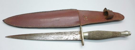 A Commando dagger with scabbard