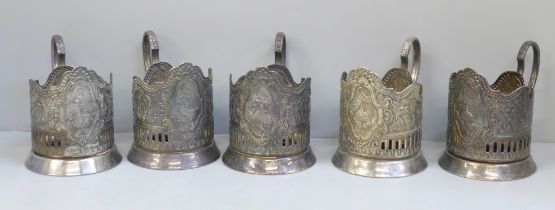 Five Russian silver plated cup holders with decoration commemorating achievements in space