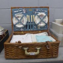 A Brexton wicker picnic hamper and a collection of table linens **PLEASE NOTE THIS LOT IS NOT