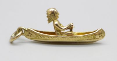 A hallmarked 9ct gold canoe charm with Native American, 2.4g