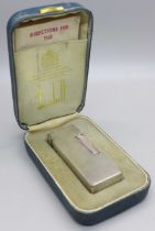 A Dunhill lighter, cased