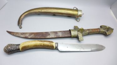 A horn handled knife with silver mount and an Eastern knife with scabbard