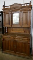A 19th Century French Henry II style oak side cabinet