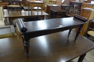 A Victorian mahogany window seat