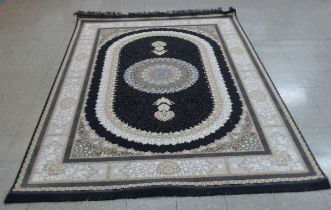 An Iranian grey ground rug, 313cm x 201cm