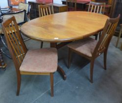 A G-Plan Fresco teak dining table and four chairs
