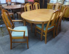 A G-Plan Fresco teak extending dining table and six Nathan teak dining chairs