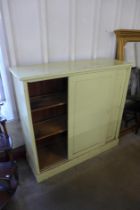A Victorian painted pine school cupboard