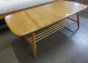 An Ercol Blonde elm and beech Windsor coffee table
