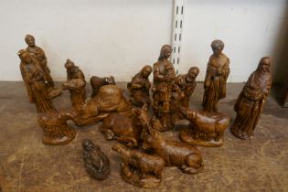 A painted composite Nativity set