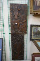 Two African carved wooden plaques